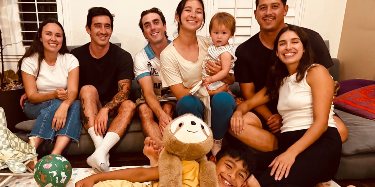 The family crowded onto one couch, the youngest two out front